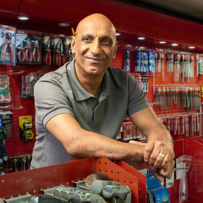 Smiling man in hardware store